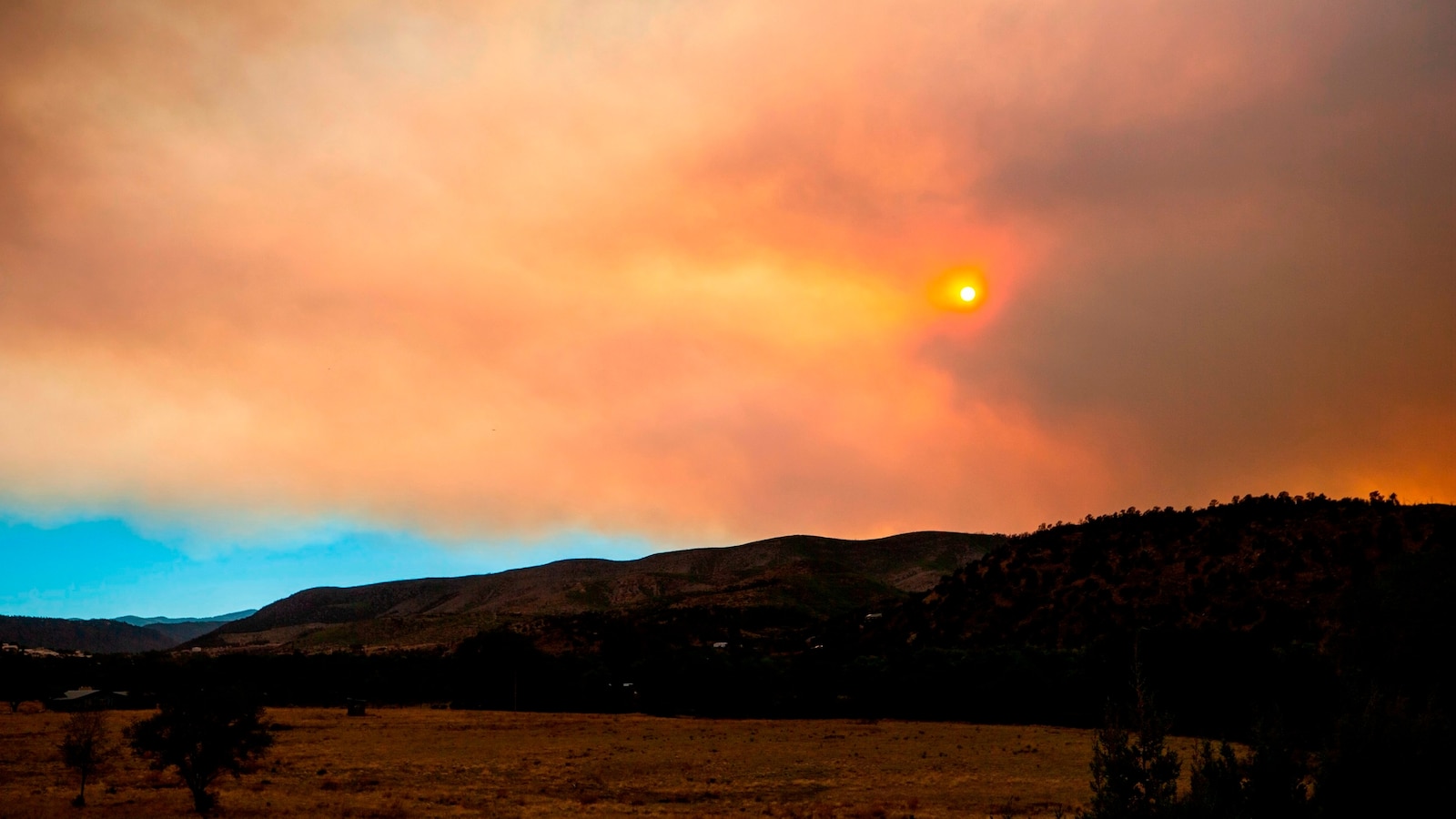 Wildfires Rage Across California and New Mexico, Claiming Lives