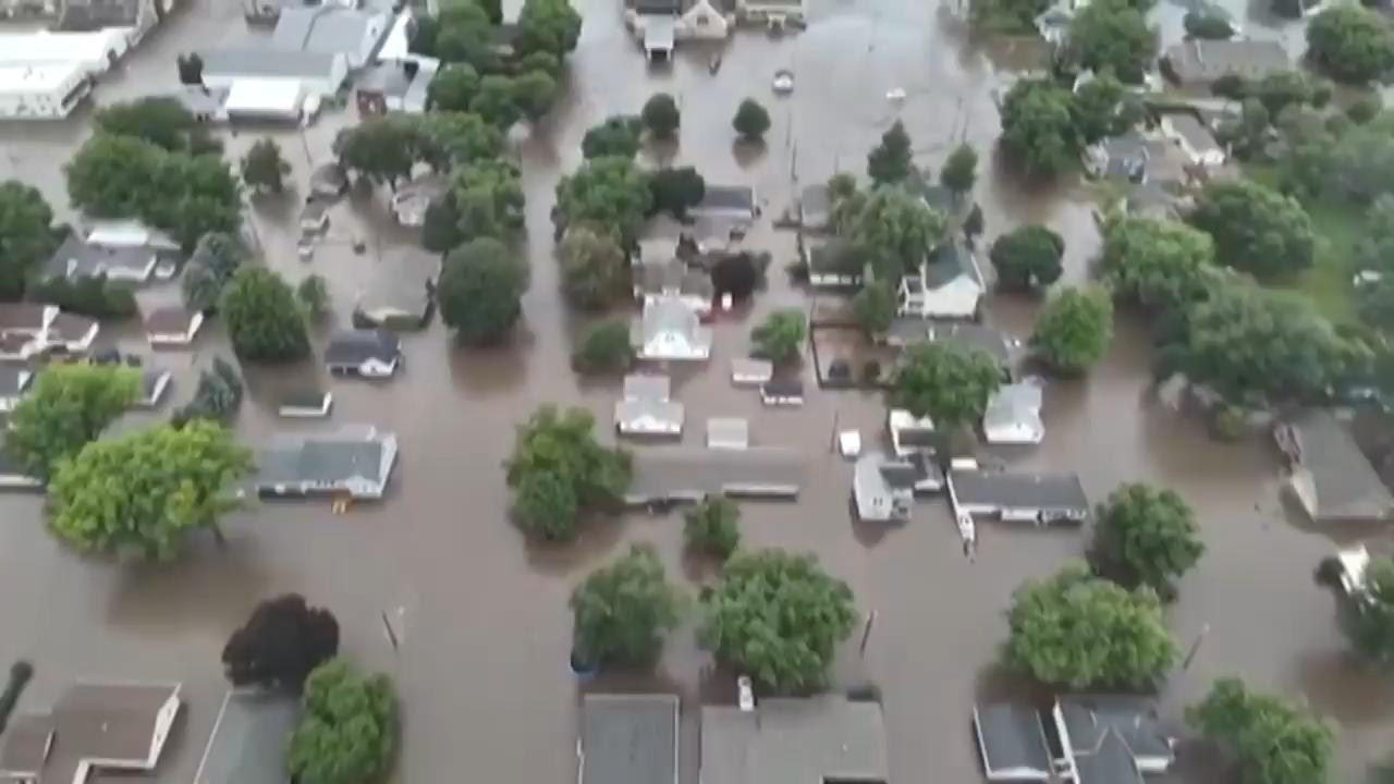 Flooding in Iowa and Heatwave Across the US